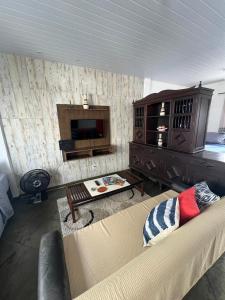 Χώρος καθιστικού στο Apê da Lêda Loft - 400m da Praia do Forte