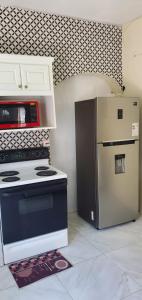 Kuchyň nebo kuchyňský kout v ubytování Dev place + 24 fotografií