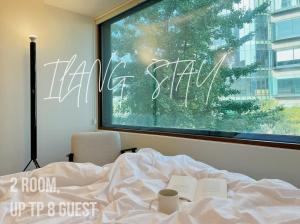 Ένα ή περισσότερα κρεβάτια σε δωμάτιο στο 이랑스테이 ILANG Stay
