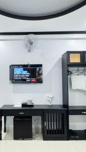 Et tv og/eller underholdning på VICTORY hotel Q8 + 37 billeder