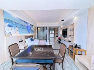 Kuchyň nebo kuchyňský kout v ubytování Wang Tian Shu Value Resort Hotel