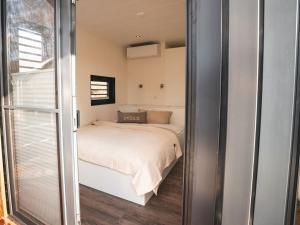 Postel nebo postele na pokoji v ubytování Weserbergland Resort