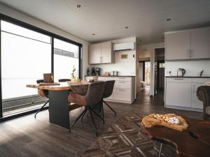 Kuchyň nebo kuchyňský kout v ubytování Weserbergland Resort + 15 fotografií