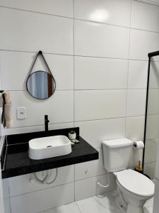 Ένα μπάνιο στο Suítes da Orla Hospedagens +42 φωτογραφίες