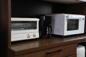 富士市にあるかんさんのお宿の電子レンジ、オーブントースター付きカウンター