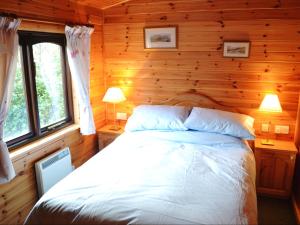 Postel nebo postele na pokoji v ubytování Glenmore Lodge