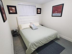 Ένα ή περισσότερα κρεβάτια σε δωμάτιο στο Forest Hills