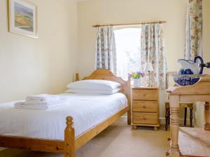 En eller flere senge i et værelse på Farndale