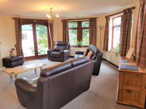 Posezení v ubytování Trebor Cottage + 19 fotografií