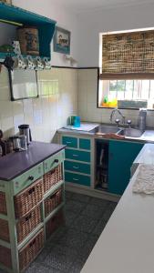 Kuchyň nebo kuchyňský kout v ubytování Quinta 4A