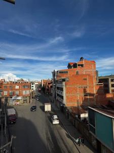 a view of a street in a city with buildings at Altura View Stay in La Paz