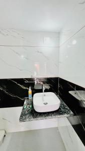 Phòng tắm tại Holiday Homestay dholavira