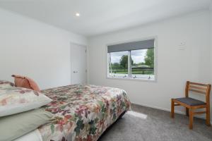 Postel nebo postele na pokoji v ubytování Barnarch Cottage