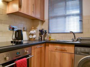 Η κουζίνα ή μικρή κουζίνα στο Bleaberry- Hewetson Court
