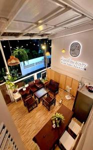 an overhead view of a restaurant with tables and chairs at Baan Puen Poonsuk in Hua Hin