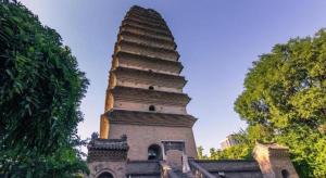 a tall tower in front of a building at Super 8 Hotel Xian Nanshaomen in Xi'an +31 photos