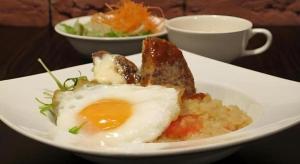 a plate of food with a fried egg on top at Mimatsu Annex in Mito