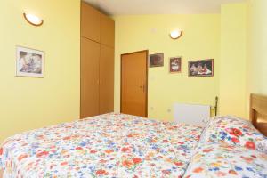 Postel nebo postele na pokoji v ubytování Villa Dario