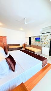 Postel nebo postele na pokoji v ubytování Sevonra Beach Resort