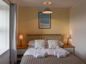 Postel nebo postele na pokoji v ubytování Sevenstones + 14 fotografií