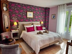 Postel nebo postele na pokoji v ubytování Les Vieilles Digues + 32 fotografií