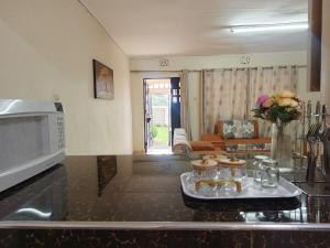 Kuchyň nebo kuchyňský kout v ubytování Keyman Address