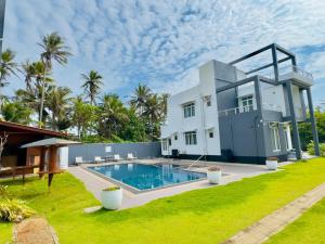 Bazén v ubytování Canela Beach Resort and Villa nebo v jeho okolí