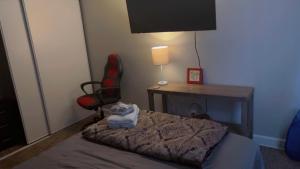 Ένα ή περισσότερα κρεβάτια σε δωμάτιο στο Serene Retreat