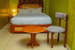 Postel nebo postele na pokoji v ubytování Primera Hotel