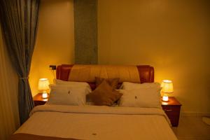 Postel nebo postele na pokoji v ubytování Primera Hotel + 2 fotografie