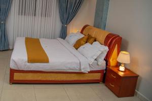 Postel nebo postele na pokoji v ubytování Primera Hotel