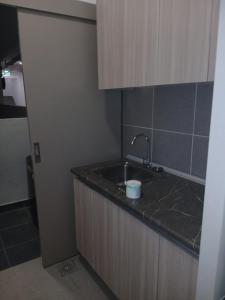 Η κουζίνα ή μικρή κουζίνα στο Youth City Residence, Nilai 2R2B