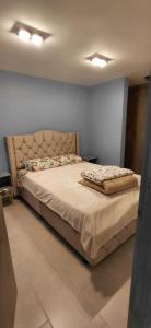 Ένα ή περισσότερα κρεβάτια σε δωμάτιο στο Apt zona turisitica Lago Sochagota