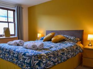 Ένα ή περισσότερα κρεβάτια σε δωμάτιο στο Bleaberry- Hewetson Court +5 φωτογραφίες