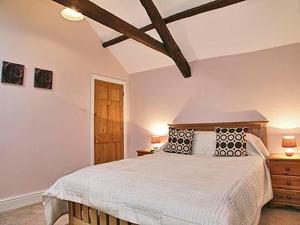 Postel nebo postele na pokoji v ubytování Well Cottage