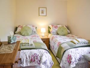 Ένα ή περισσότερα κρεβάτια σε δωμάτιο στο Daisy's Cottage Annexe - 28240 +4 φωτογραφίες