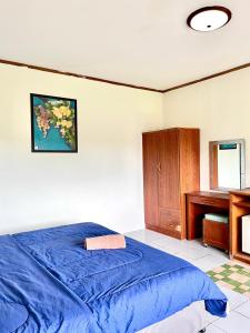 Ένα ή περισσότερα κρεβάτια σε δωμάτιο στο BUK LANTA