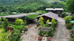 an aerial view of a house with plants and trees at สว้าฮิลล์ น่าน สะปัน - SAWA Hills in Ban Huai Ti +34 photos