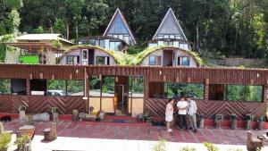 a group of people standing in front of a house at Annapurna Nature Retreat, Namchi South Sikkim in Singtām