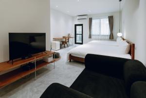 Μια τηλεόραση ή/και κέντρο ψυχαγωγίας στο 日上微旅 stay & café