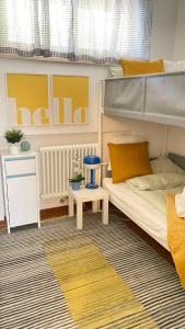 Ένα ή περισσότερα κρεβάτια σε δωμάτιο στο Appartamento Caterina