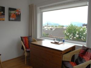 a room with a desk and a large window at Peel Wyke in Keswick