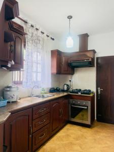 Η κουζίνα ή μικρή κουζίνα στο White Swan Villa Unawatuna