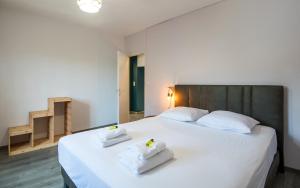 En eller flere senge i et værelse på L'air du Tarn fibre jardin parking