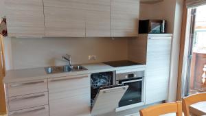 Køkken eller tekøkken på Mansarda Dolores + 43 billeder