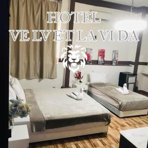 Postel nebo postele na pokoji v ubytování La vi da ve lv et