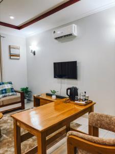 TV a/nebo společenská místnost v ubytování Meiran Apartments