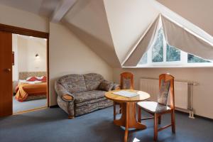 Posezení v ubytování FAMILIJNY Ośrodek Wypoczynkowy Krynica Zdrój + 102 fotografií