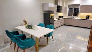 Η κουζίνα ή μικρή κουζίνα στο Seabreeze Residencia