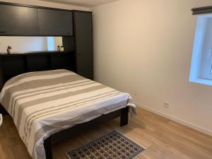 Postel nebo postele na pokoji v ubytování Maison à la campagne